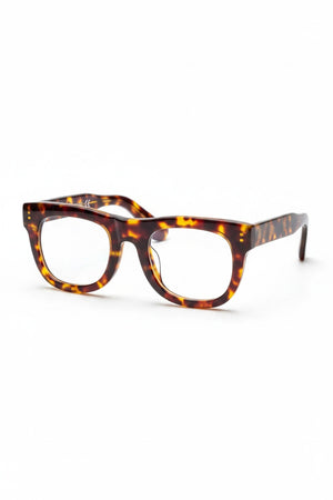 CADDIS D28 Progressive Readers in Turtle feature thick, rectangular acetate frames with a tortoiseshell pattern, shown on a white background and angled slightly to the left—ideal for those seeking premium eyewear.