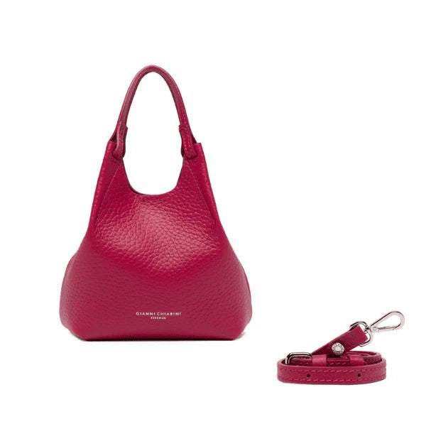 The GIANNI CHIARINI MINI DUA BAG IN DESERT ROSE is a textured, bright pink double grain leather mini-bag with short handles, a matching detachable shoulder strap with silver hardware, and the brand name printed in white near the base.