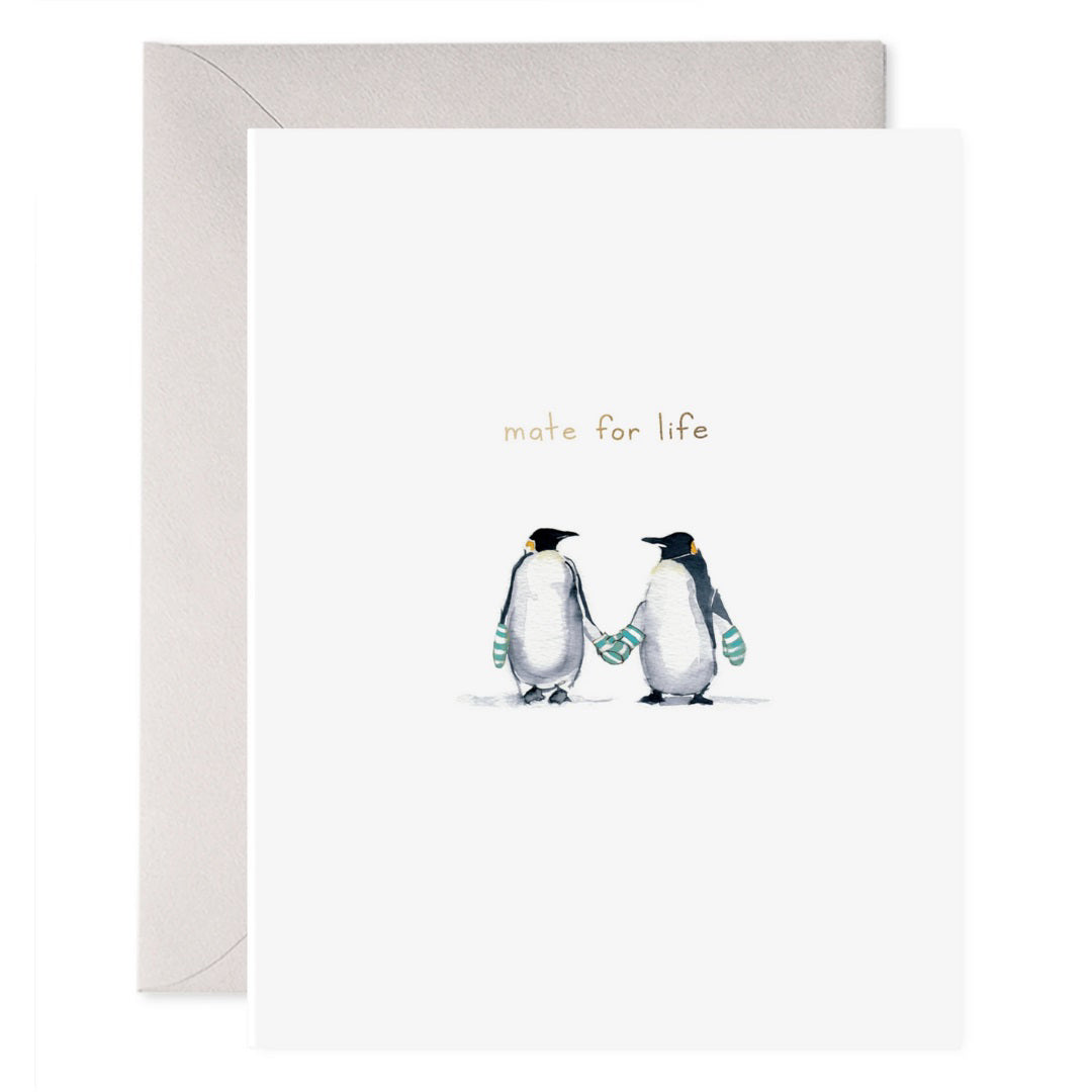 The E. FRANCES PAPER - MATE FOR LIFE card features two illustrated penguins holding flippers and wearing scarves with “mate for life” above them. Printed on heavyweight paper, it includes a light gray envelope from E. FRANCES PAPER.