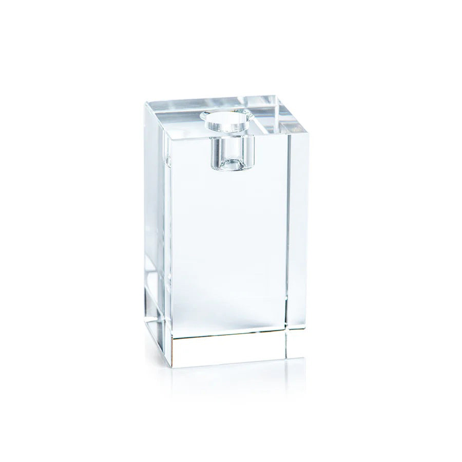 The ZODAX SQUARE CRYSTAL GLASS TAPER HOLDER 4.75&quot; is a transparent, rectangular glass holder with a square cap, shown on a white background. Its sharp edges and clean design make it a stylish decorative piece.
