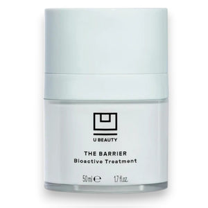 A white cylindrical 50ml jar of U BEAUTY THE BARRIER BIOACTIVE TREATMENT, featuring black text and the logo—a gel-cream overnight treatment that supports the skin’s moisture barrier.