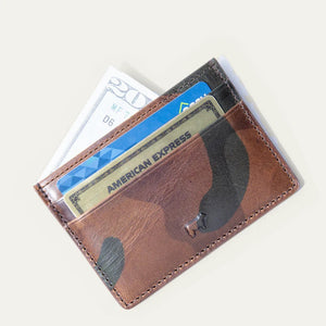 Two WILL LEATHER GOODS Military Pocket Card Cases in military green are shown on a light background: one features RFID-blocking protection with a transparent ID slot, while the other displays card slots and an embossed animal logo.