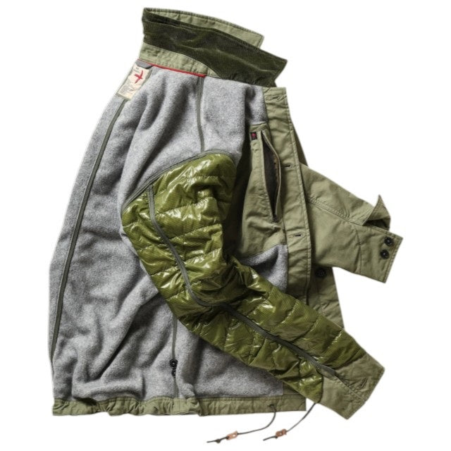 The RELWEN Pile-Lined Chore Coat in Palm Green is a stylish workwear jacket with a green quilted sleeve, olive-green collar and cuffs, and a soft gray fleece body with rugged lining, shown lying open on a white background.