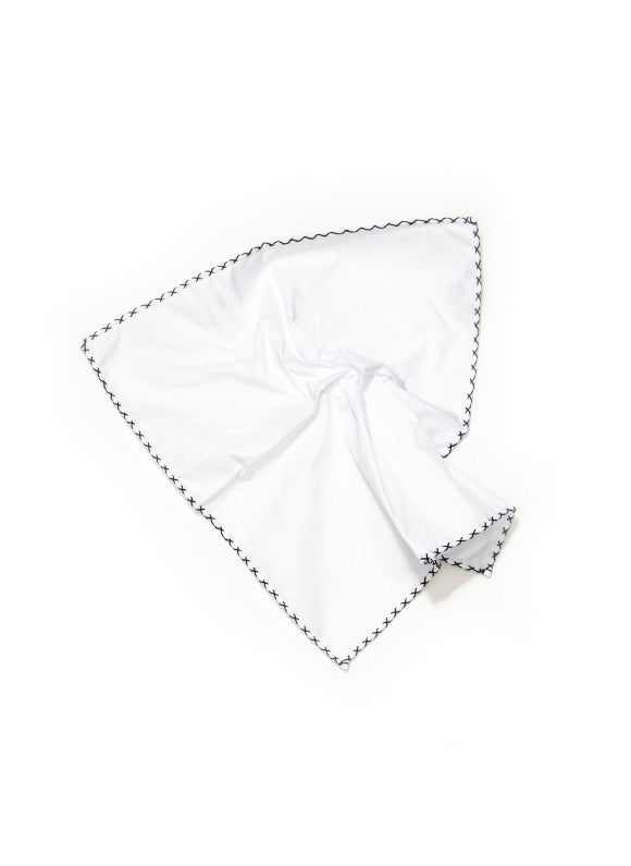 The EDWARD ARMAH Hem Stitched Pocket Square features white cotton with black zigzag edge stitching, shown flat on a white background.