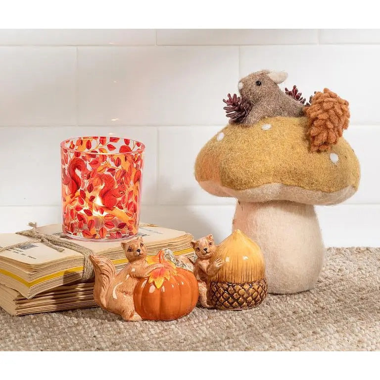 The ABBOTT MOUSE IN MUSHROOM features a felted mushroom with white spots and a small felt mouse nestled among miniature pinecones, capturing whimsical charm in this fall decor.