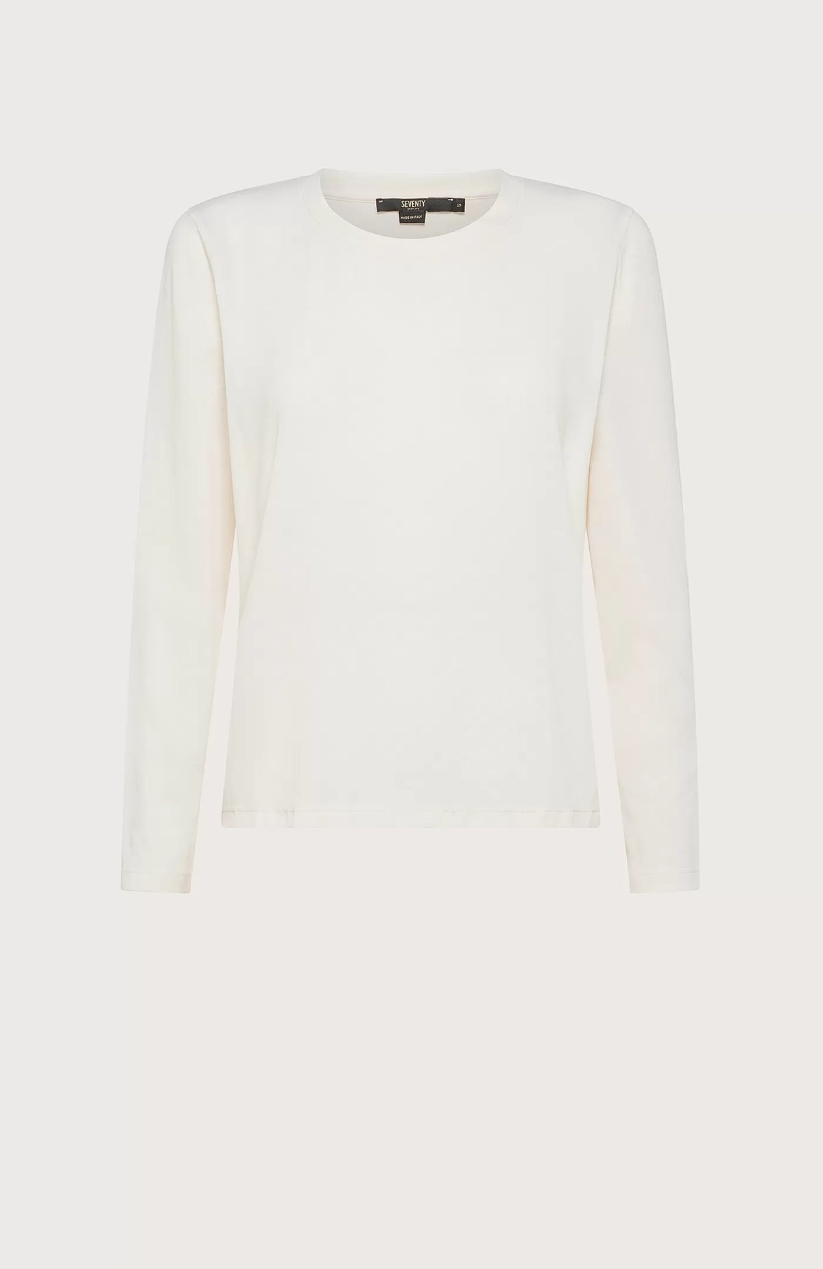 A plain, long-sleeve, white crew-neck T-shirt from SEVENTY displayed against a light background. The fabric appears smooth and the shirt has a relaxed fit. A black garment tag at the collar indicates that it's made in Italy.