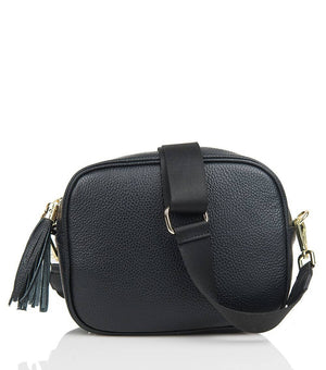 The LE BORSETTE leather crossbody bag is shown in green, showcasing a rectangular shape. It features a wide, adjustable green strap with a gold buckle and clasp. The bag is equipped with a gold zip closure and complemented by a green tassel pull. Made from genuine leather, it is placed against a white background.