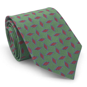 The BIRD DOG BAY PETER-BLAIR Archer Woven Silk Tie in Green, handmade in New York, features a bold geometric red diamond pattern outlined in blue and showcases its pointed end when displayed flat.