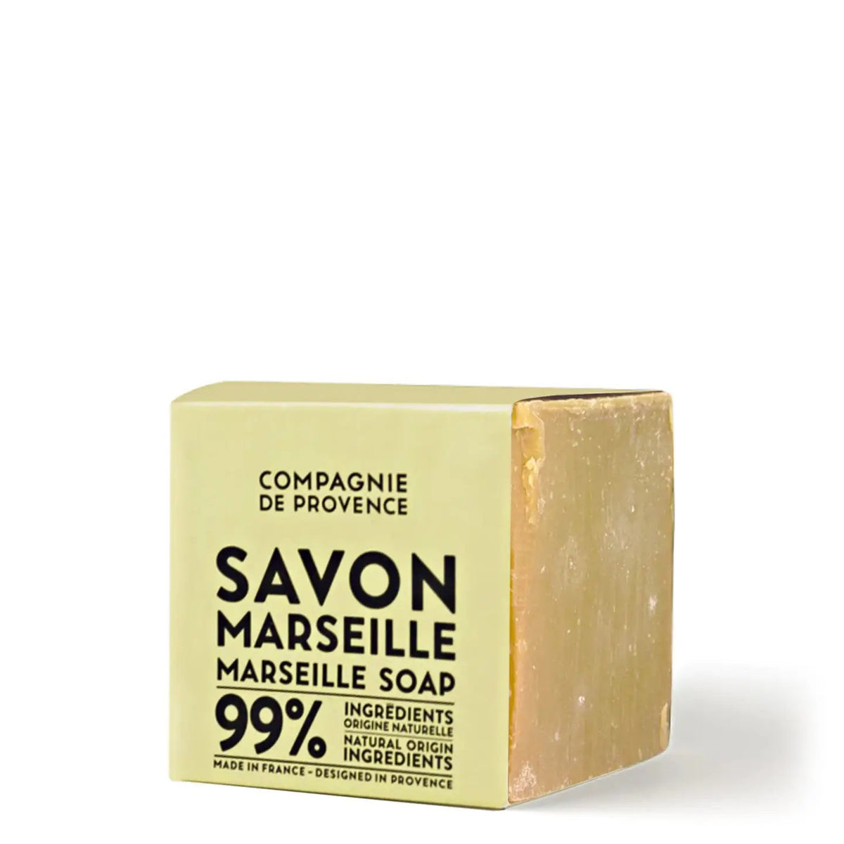 A beige package labeled &quot;COMPAGNIE DE PROVENCE - AUTHENTIC CUBE OF SOAP FRAGRANCE FREE 13.8OZ&quot; by CIE LUXE BRANDS contains a visible block of natural Marseille soap made with vegetable oils.