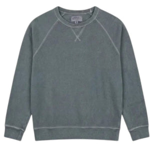A close-up view of a person wearing the HARTFORD light fleece sweatshirt in charcoal, made in Portugal, featuring a distinctive X-shaped decorative stitch detail at the base of the collar.