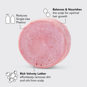The pink KITSCH - CASTOR OIL SHAMPOO BAR is 3.2 oz (91g) of eco-friendly, color-safe, pH-balanced, vegan, and plastic-free hair care. Ideal for those seeking balance and sustainability with its "Nourishing Solid Shampoo" label for a well-balanced scalp.