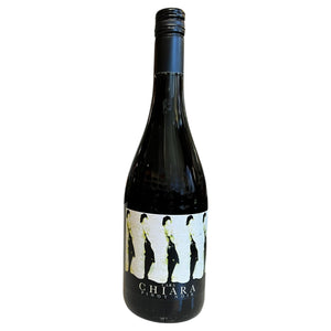A bottle of CHIARA PINOT NOIR 2021 with a label featuring a repeating silhouette illustration of a person and the text “CHIARA PINOT NOIR.”