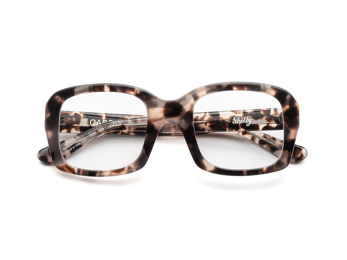 CADDIS - SHELBY PROGRESSIVE READERS by CADDIS are rectangular eyeglasses with oversized frames in a brown and black tortoiseshell pattern, crafted from premium acetate and shown from the front on a white background.