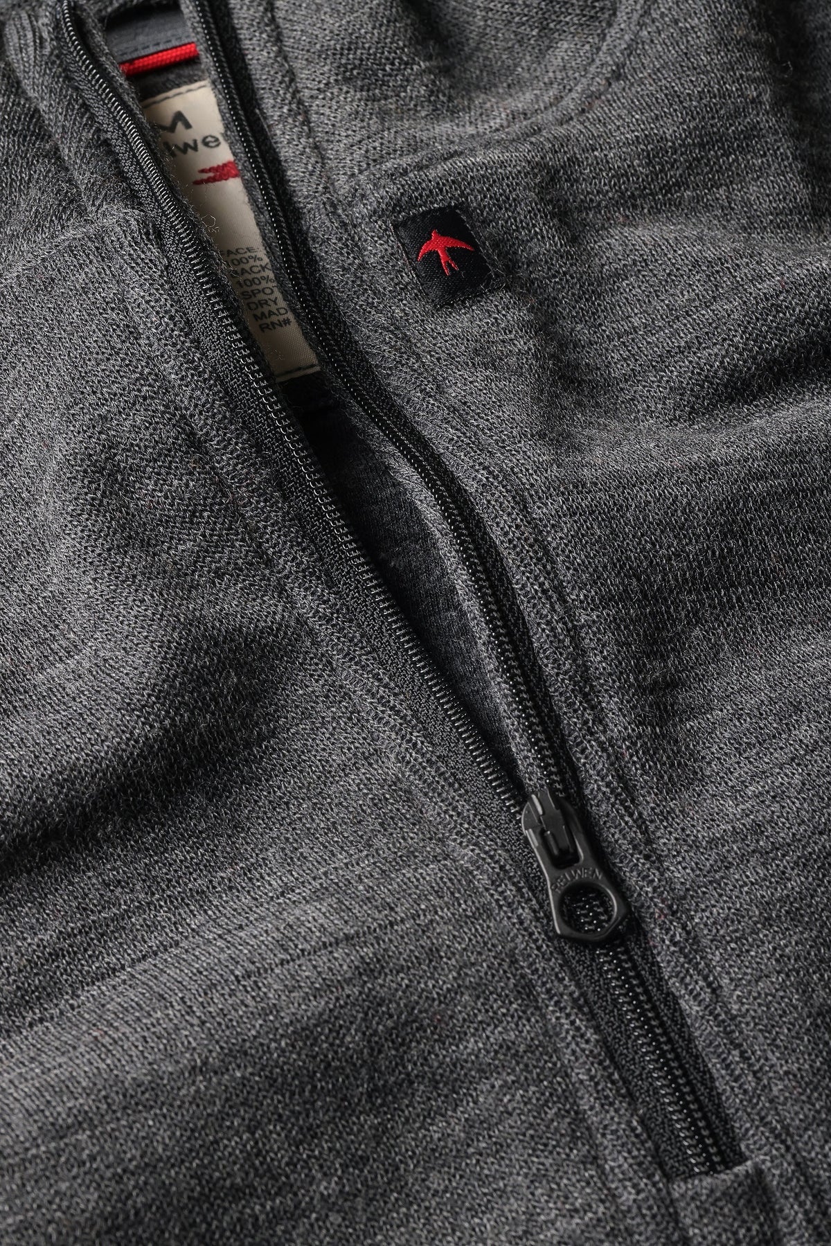 The RELWEN Wool and Cotton Quarter Zip in Charcoal Heather is laid flat on a white background, featuring long sleeves slightly bent at the sides and a collar partially unzipped.