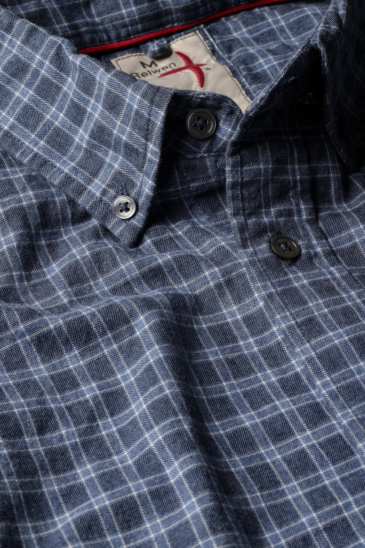The RELWEN - DRESS BLUES SHIRT IN NAVY GINGHAM PLAID by RELWEN is a long-sleeve button-up shirt crafted from 100% cotton shirting for a comfortable, classic fit, shown laid flat on a white background.