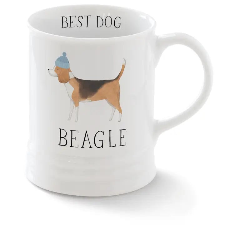 The FRINGE STUDIO - CERAMIC BEAGLE MUG by PET SHOP BY FRINGE STUDIO features a beagle in a blue hat, "BEST DOG" above, and "BEAGLE" below. This white ceramic mug is dishwasher safe for easy cleaning.
