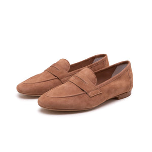A side view showcases the MICHELE LOPRIORE - PAOLA SUEDE LOAFER in beige against a white background. This mocassin-style loafer, crafted from genuine leather, features a smooth texture with a simple design and low heel.