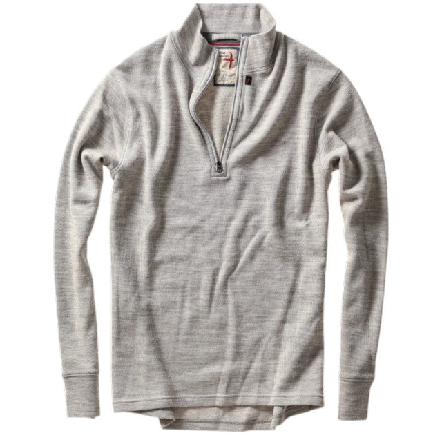 RELWEN - Wool and Cotton Quarter Zip in Light Grey Heather, a long-sleeve pullover sweater from RELWEN, is laid flat on a white background. This lightweight, layer-ready sweater features a soft, slightly textured double-faced knit fabric and displays a visible tag near the quarter-zip collar.