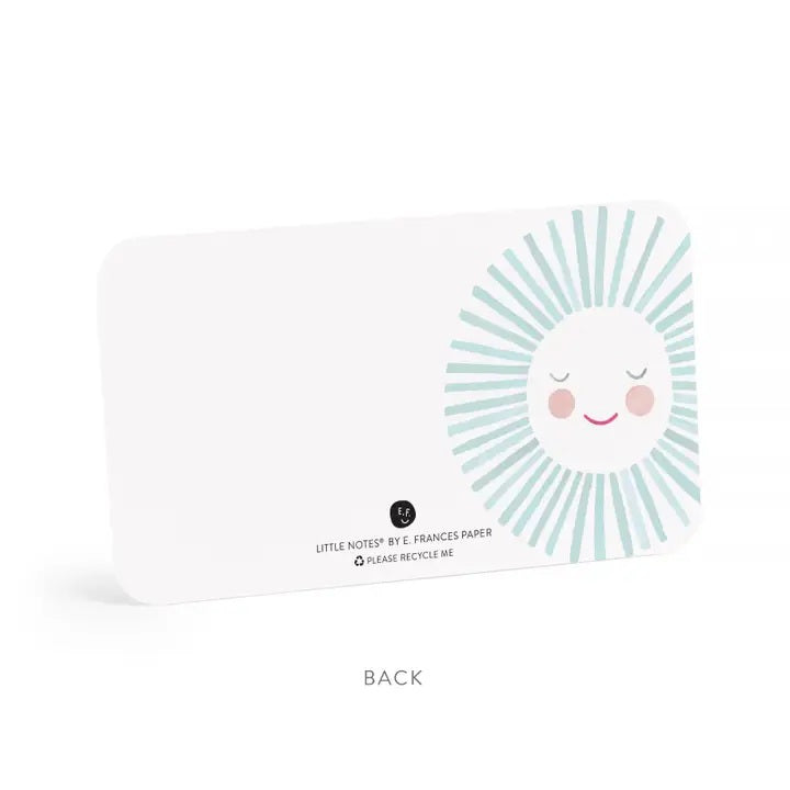 The E. FRANCES - LITTLE NOTES BLUE SUNSHINE mini card features a smiling, hand-painted watercolor sun with a white face, pink cheeks, closed eyes, and light blue rays. Text below: "Little Notes by E. Frances Paper. Please Recycle Me.