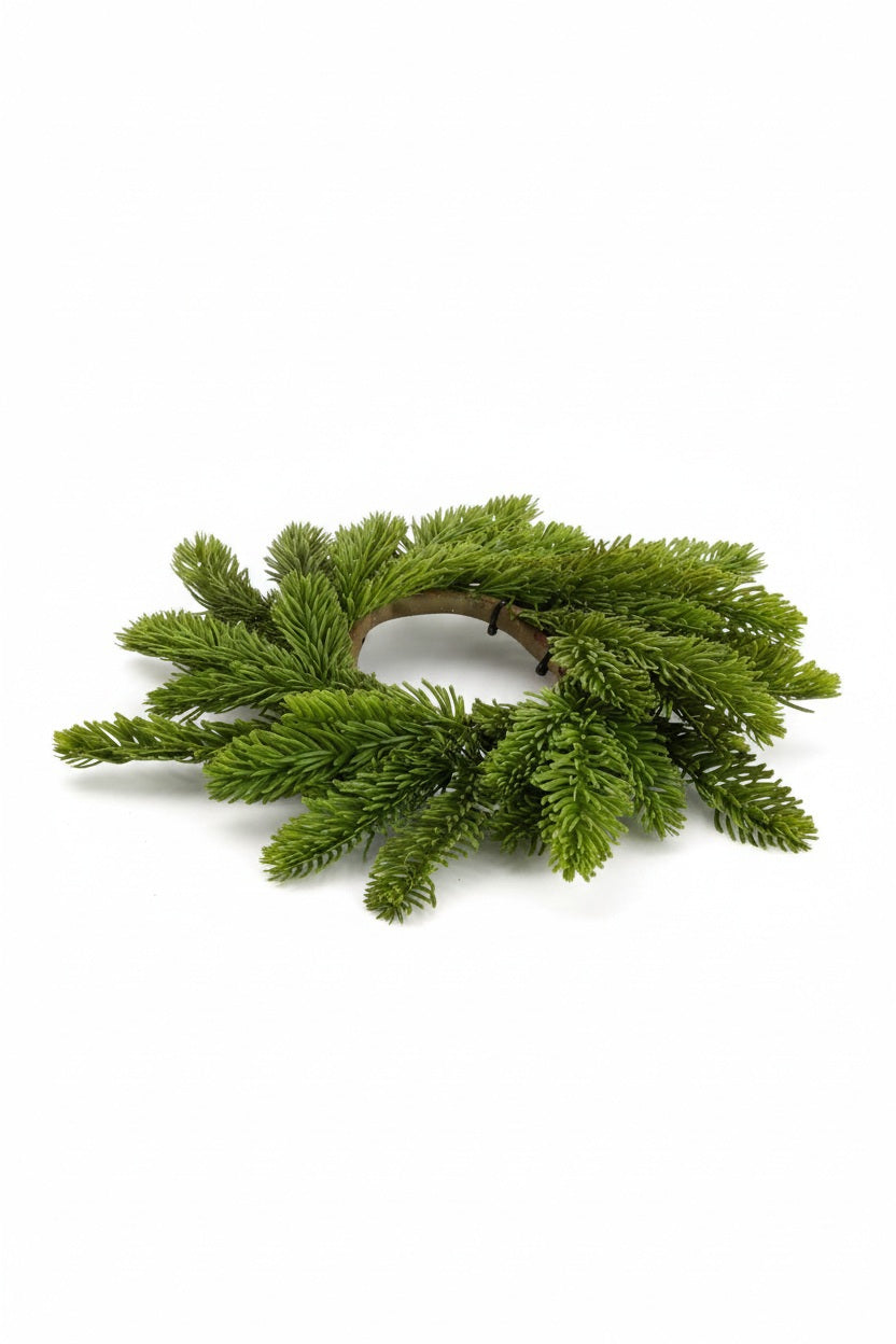 A 14-inch CEDAR MINI WREATH CANDLE RING by RAZ IMPORTS made of green cedar-like branches.