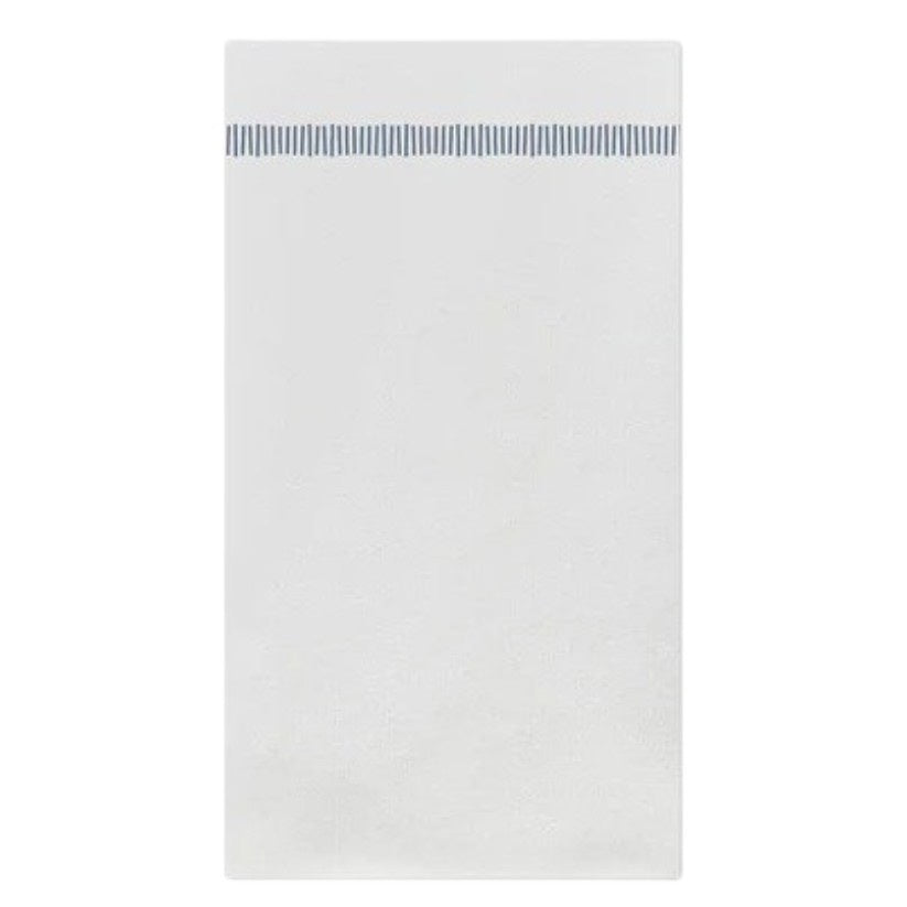 The VIETRI - PAPERSOFT FRINGE GUEST NAPKINS, BLUE, by VIETRI, features a white rectangular napkin with a single row of thin, evenly spaced blue stripes accenting one end, displayed against a plain background.