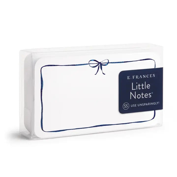E. FRANCES PAPER’s LITTLE NOTES NAVY BOW is a rectangular white mini note card with a thin hand-drawn navy border and a small bow at the top—blank inside, ideal for any boxed set of Little Notes.