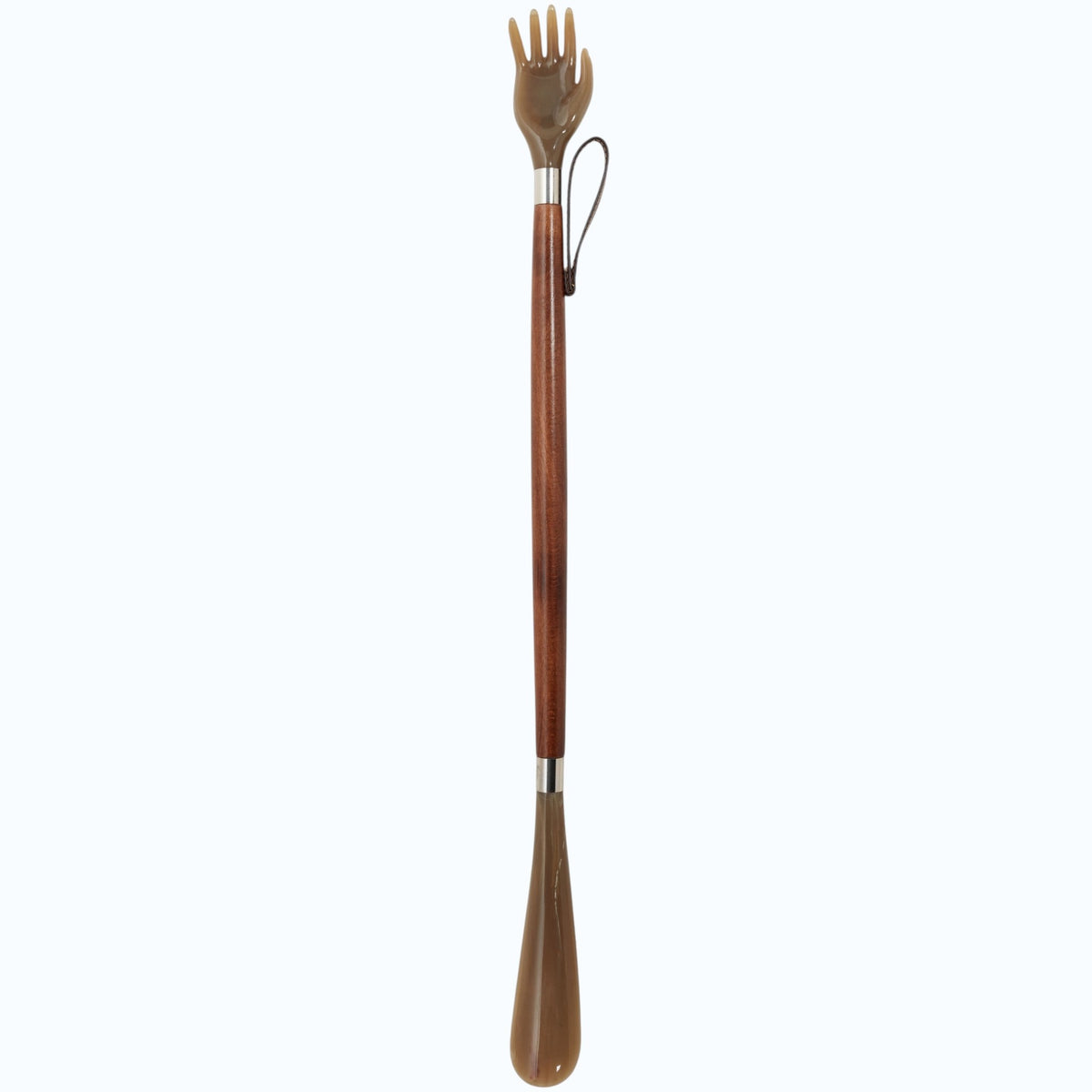 The HARVY CANES - BACKSCRATCHER SHOE HORN has a brown plastic hand, curved shoehorn, and wooden handle with hanging loop—handcrafted in Spain by HARVY CANES for quality and style, making it an ideal gift.