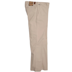 PENNBILT - THE PLAINSMAN PANT IN KHAKI by PENNBILT, featuring beige men’s stretch twill fabric and a brown patch label on the waistband, is neatly folded and displayed against a plain white background.