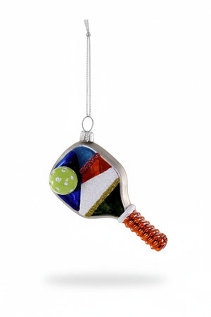 Cody Foster GLASS PICKLEBALL PADDLE ORNAMENT measuring 1.5 x 2.5 x 4 inches, featuring a colorful geometric design, a ribbed handle, and an attached ball.