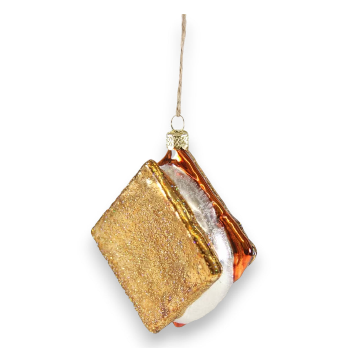The CODY FOSTER S&#39;MORE ORNAMENT features glittery gold graham crackers, a white marshmallow, and brown chocolate—hanging by a string, it&#39;s a perfect collectible or a thoughtful gift for design lovers.
