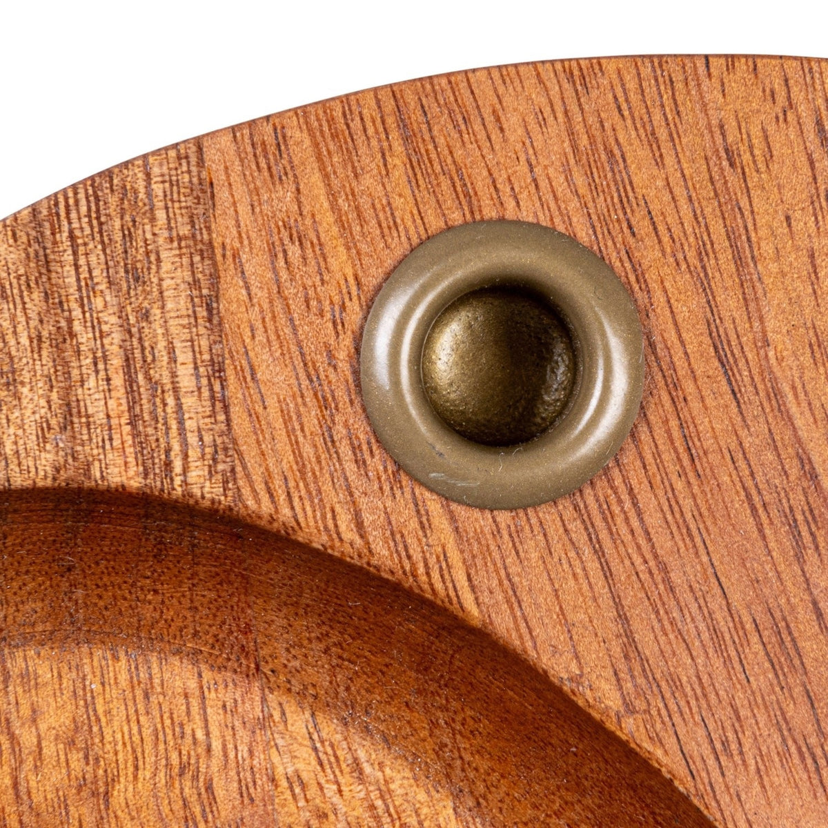 The CREATIVE COOP Mango Wood and Metal Taper Holder with Tray features an oval mango wood base, three round brass inlays, and a shallow recessed area—ideal for displaying candles or your favorite decor.