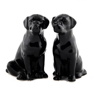 The QUAIL DESIGNS QUAIL CERAMICS Black Labrador Salt and Pepper Set features handpainted stoneware dogs sitting back-to-back. Dishwasher safe, these charming figurines make a delightful table addition.