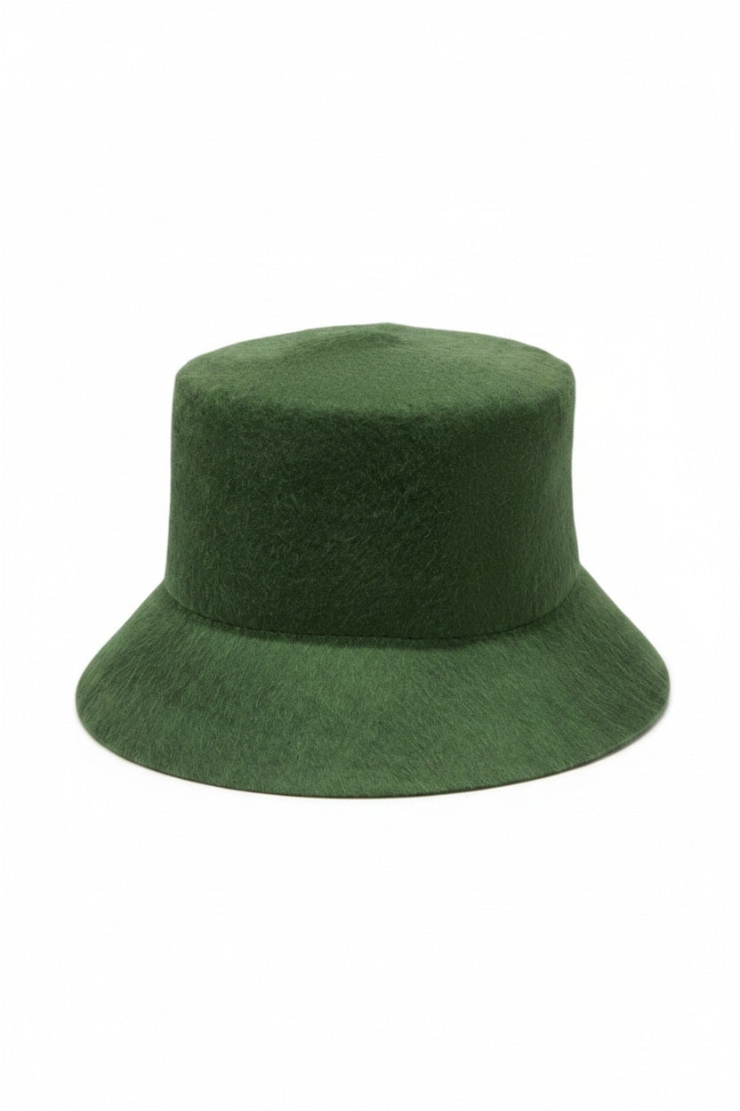WYETH's TENLEY BUCKET HAT, a blue bucket hat made from fuzzy mohair wool and featuring a wide brim, is presented against a simple white background.
