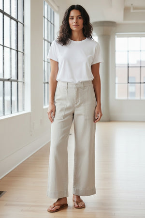 The FRANK & EILEEN Wexford Patch Pocket Wide Leg Pant in Cement is a light beige Italian Performance Linen trouser with front patch pockets, belt loops, and a high waist, shown laid flat on a white background.