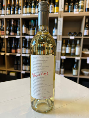 A clear glass bottle of LAUREL GLEN SAUVIGNON BLANC 2021 by FREEDOM BEVERAGE stands upright on a plain white background. The wine has a silver screw cap and a label with red text and black details, showcasing its Russian River Valley origin.