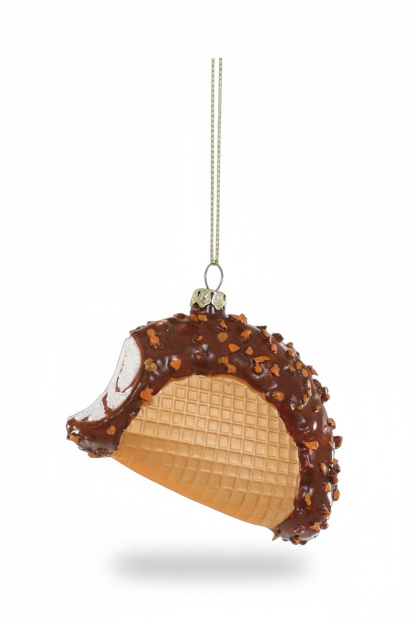 3.5-inch CHOCO TACO ORNAMENT by CODY FOSTER, a glass holiday ornament shaped like an ice cream taco dipped in chocolate with nut toppings.