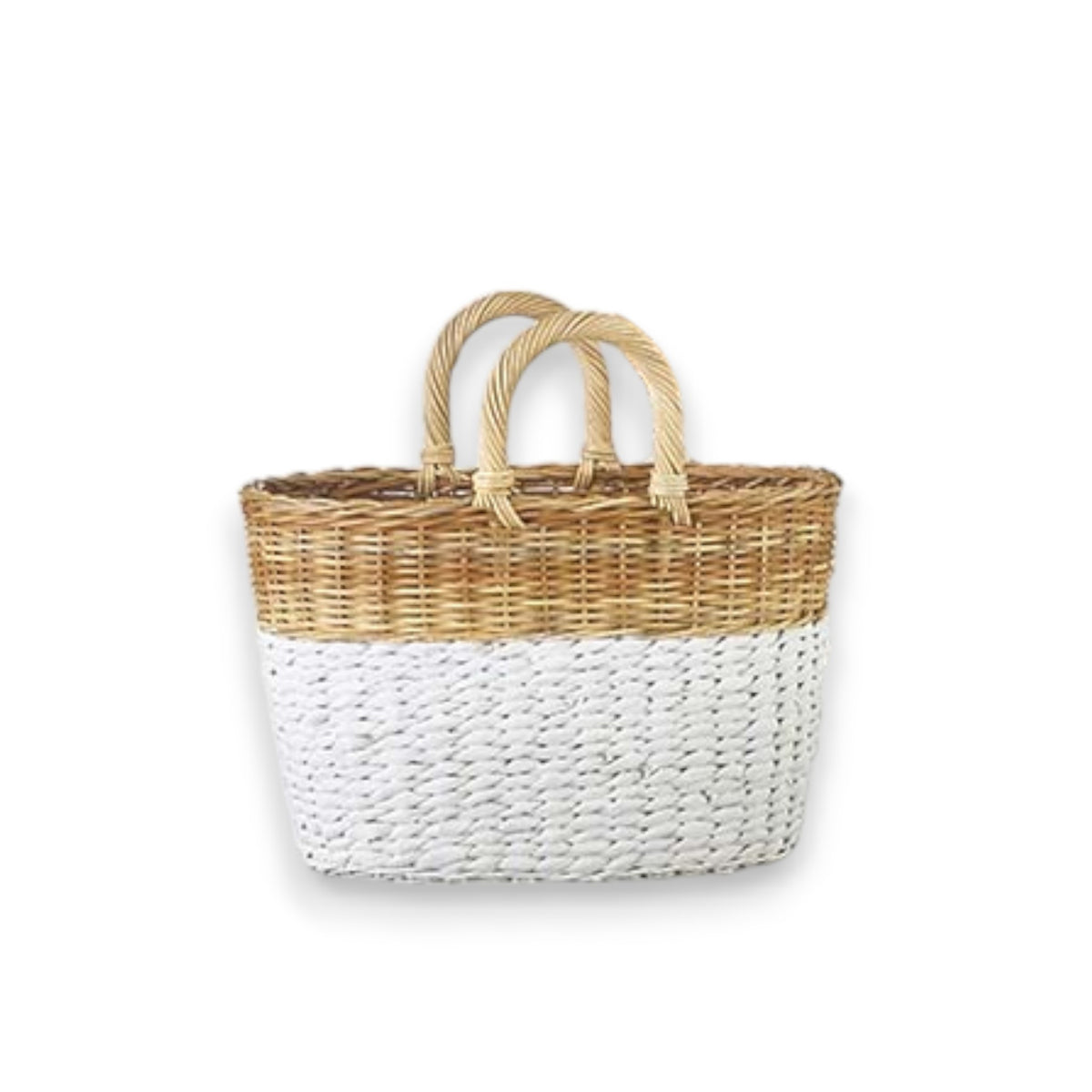 The TWO-TONE HANDLED BASKET - SMALL by RAZ IMPORTS is a decorative wicker basket crafted from rattan and seagrass. It features a medium size, flat base, round handles, and an open top. The bottom half is elegantly painted white, merging flawlessly with its natural tan on the top half. The basket is photographed against a simple white background.
