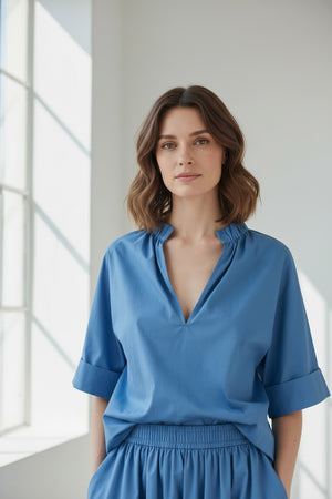 A plain, solid square in Provence Blue inspired by the MEIMEIJ Gathered Neck Blouse, featuring no patterns, text, or objects.