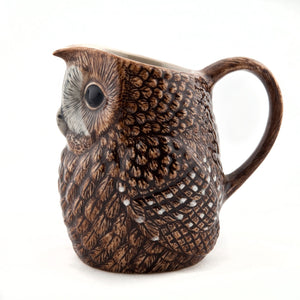 The QUAIL DESIGNS QUAIL CERAMICS - TAWNY OWL JUG LARGE is a hand-painted stoneware jug featuring realistic brown and white feather details, large dark eyes, and a rounded owl shape, shown against a plain white background.