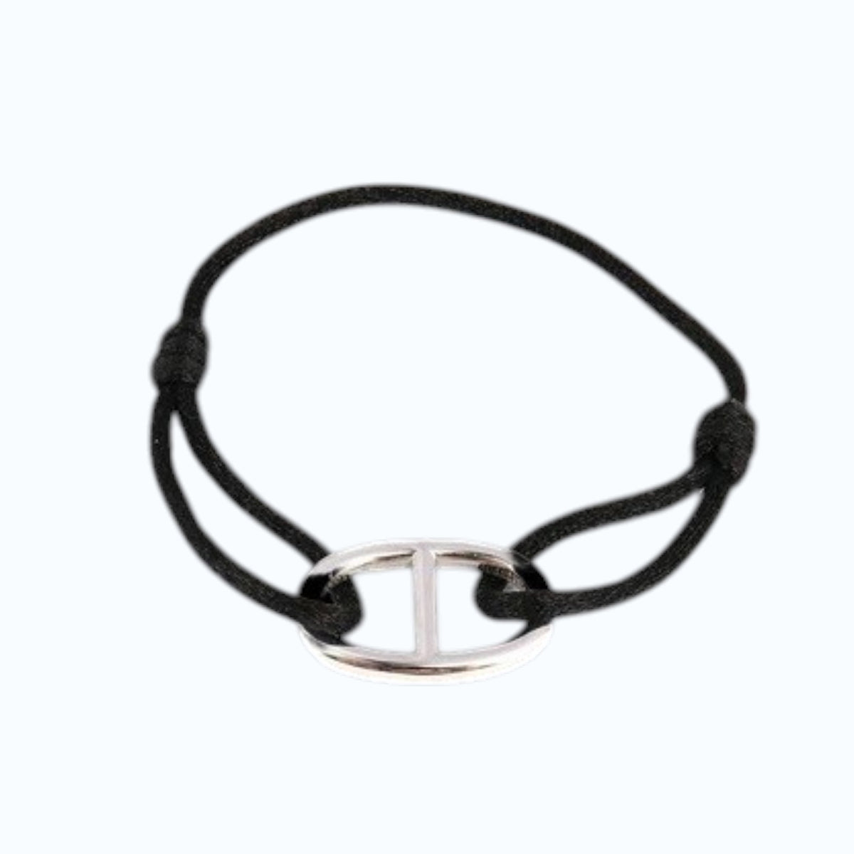The STOLEN RICHES Viseu String Bracelet features an anchor chain fixture in black, shown on a light background.
