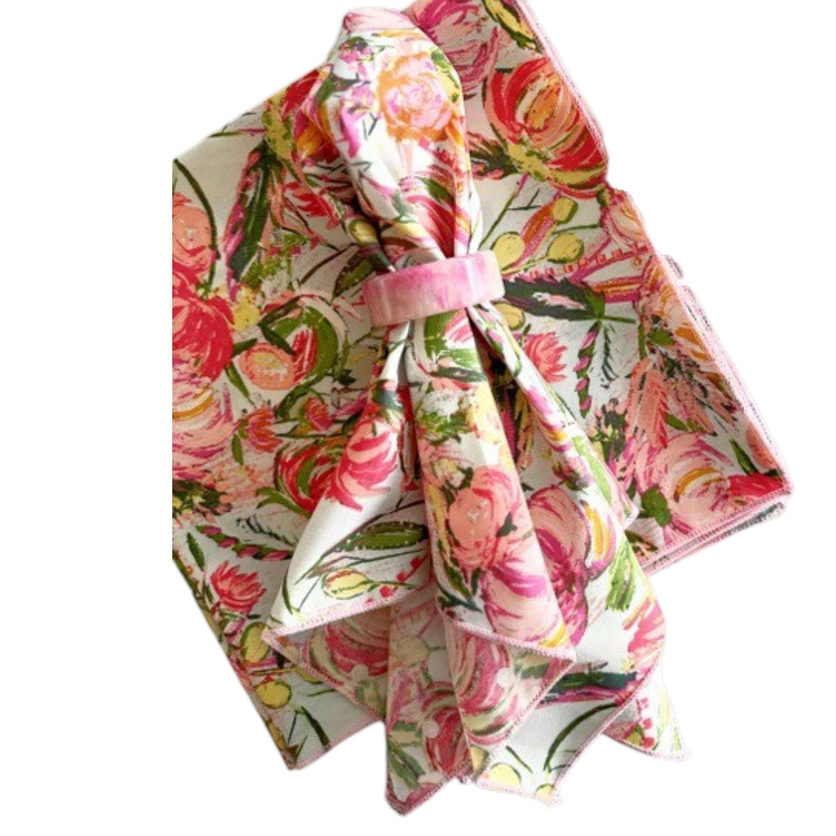 Three DOT AND ARMY FLORAL FROLIC DINNER NAPKINS in pastel pink, green, and yellow floral patterns are shown on a white surface—super soft, one is folded with a fabric napkin ring while two are stacked.
