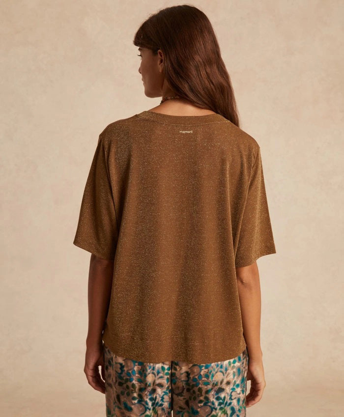 The MOMONI - IORA LUREX JERSEY T SHIRT by MOMONI is a red, short-sleeve, loose-fitting T-shirt with a subtle shimmer. Crafted from soft lurex jersey, this shirt features a round neckline and is made of a soft, lightweight material. Made in Italy. The background is plain white.