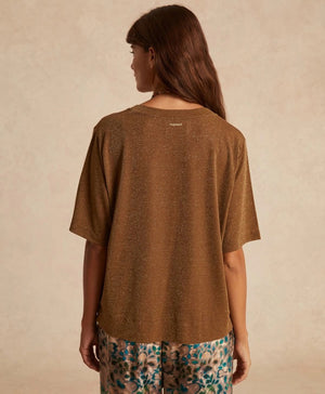 The MOMONI - IORA LUREX JERSEY T SHIRT by MOMONI is a red, short-sleeve, loose-fitting T-shirt with a subtle shimmer. Crafted from soft lurex jersey, this shirt features a round neckline and is made of a soft, lightweight material. Made in Italy. The background is plain white.