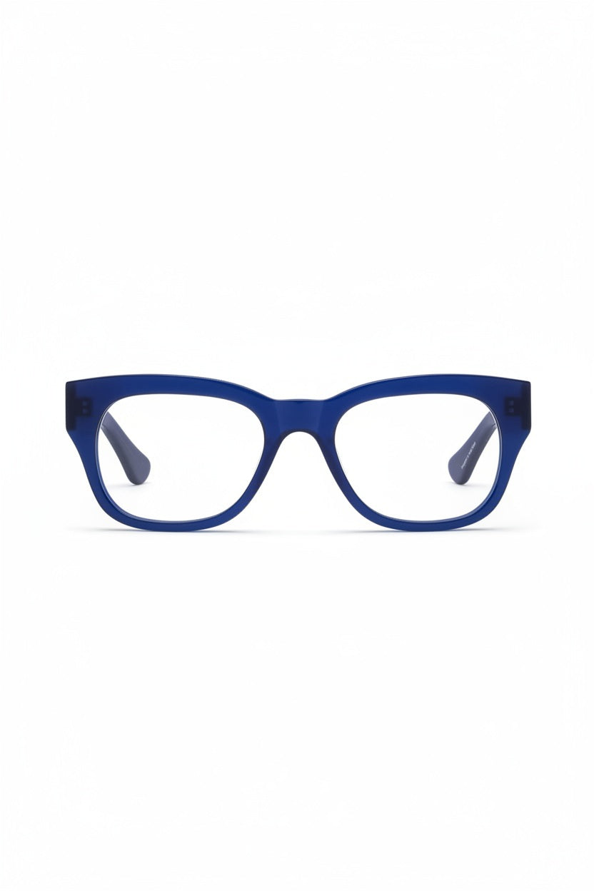 A pair of CADDIS MIKLOS Progressive Readers in Gloss Minor Blues, featuring blue rectangular frames and clear, scratch-resistant lenses, displayed from the front on a white background.