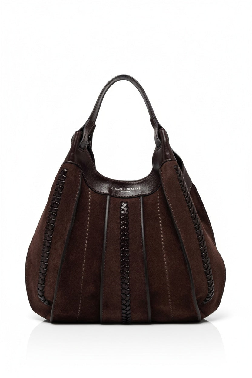 The GIANNI CHIARINI - DUA SUEDE HANDBAG features dark brown leather and suede with braided accents, rounded handles, and a slightly slouchy, spacious structure, shown against a white background.