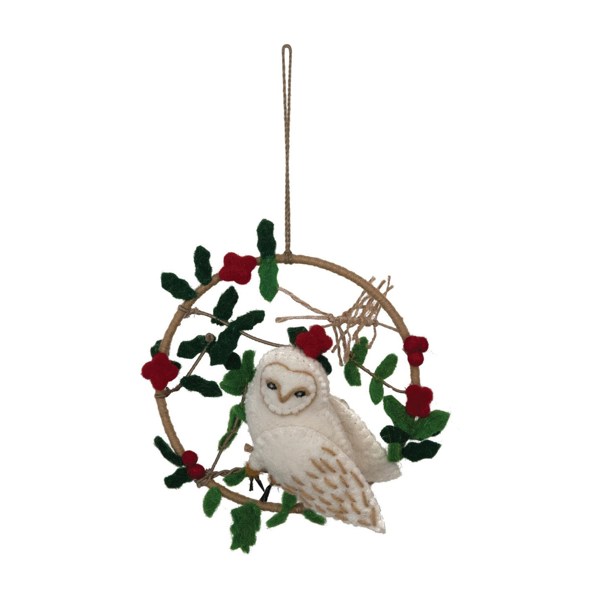 The CREATIVE COOP FELT OWL IN WREATH features a handmade felt owl with brown accents perched on a twig ring, decorated with green leaves and red flowers, hanging against a light gray background.