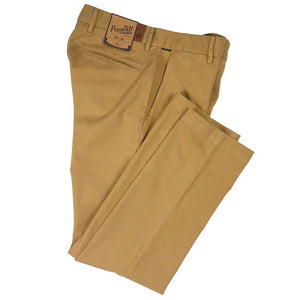 Close-up of PENNBILT - THE PLAINSMAN PANT IN DARK KHAKI, featuring tan Pima cotton fabric with a partially unzipped brass zipper and an open button. A blue “PENNBILT” label is sewn near the waistband.