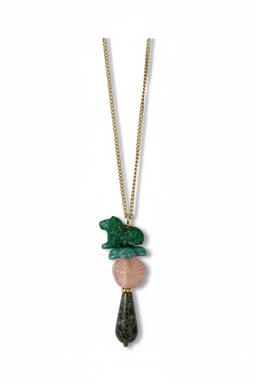 Experience the SANDRINE FRANCE STUDIO - COMPANION TROY NECKLACE by SANDRINE FRANCE STUDIO—a handmade NYC gold chain necklace featuring three stacked pendants: a Green Aventurine Horse carved animal at the top, a pink carved round bead in the middle, and a teardrop-shaped Zebra Jasper stone at the bottom.