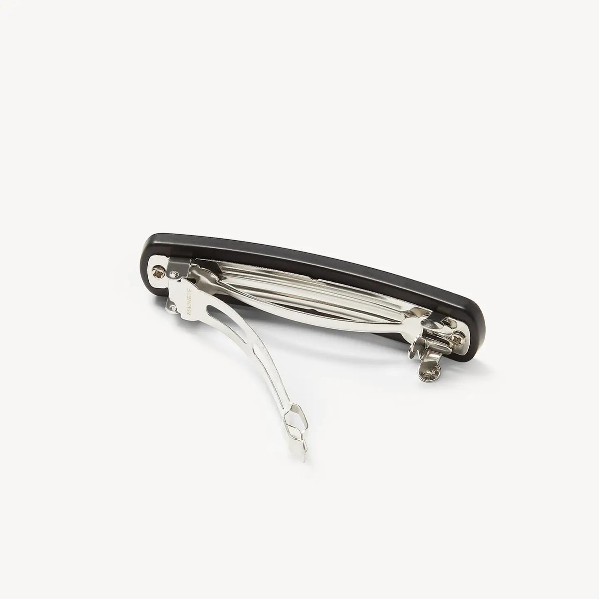 The MACHETE No. 3 Heirloom Barrette in Black Matte is a simple, handmade rectangular hair accessory with rounded edges, crafted from cellulose acetate and displayed against a plain white background.