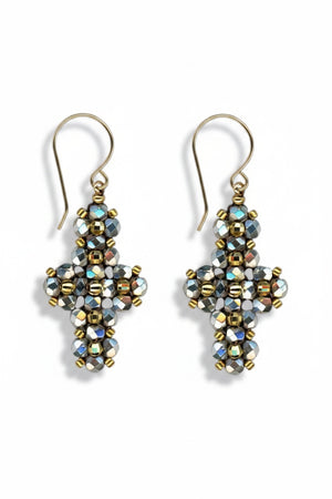 The MIGUEL ASES - PYRITE MIYUKI CROSS EARRINGS by MIGUEL ASES, INC. feature handcrafted dangling cross shapes with metallic and iridescent pyrite beads, finished with gold hooks—a stunning jewelry piece.